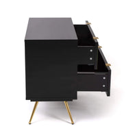 Modern chest of drawers in black and gold by Seletti