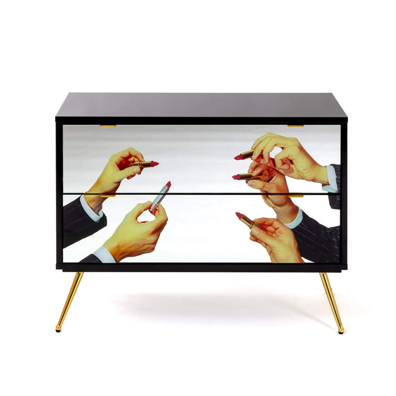 Surreal two-drawer chest in black and gold by Selett