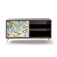 Artistic sideboard with Toiletpaper Magazine snakes motif by Seletti

