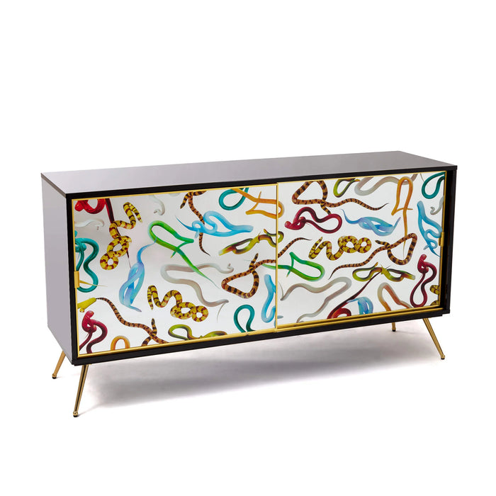 Surreal sliding door cabinet in black and gold with snakes artwork