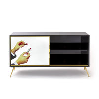Artistic sideboard with Toiletpaper Magazine lipstick design by Seletti