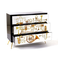 Statement storage chest with Toiletpaper Magazine trumpet motif