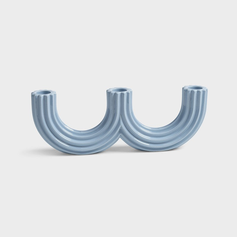 glossy light blue ceramic churros candle holder showing curved twin arches