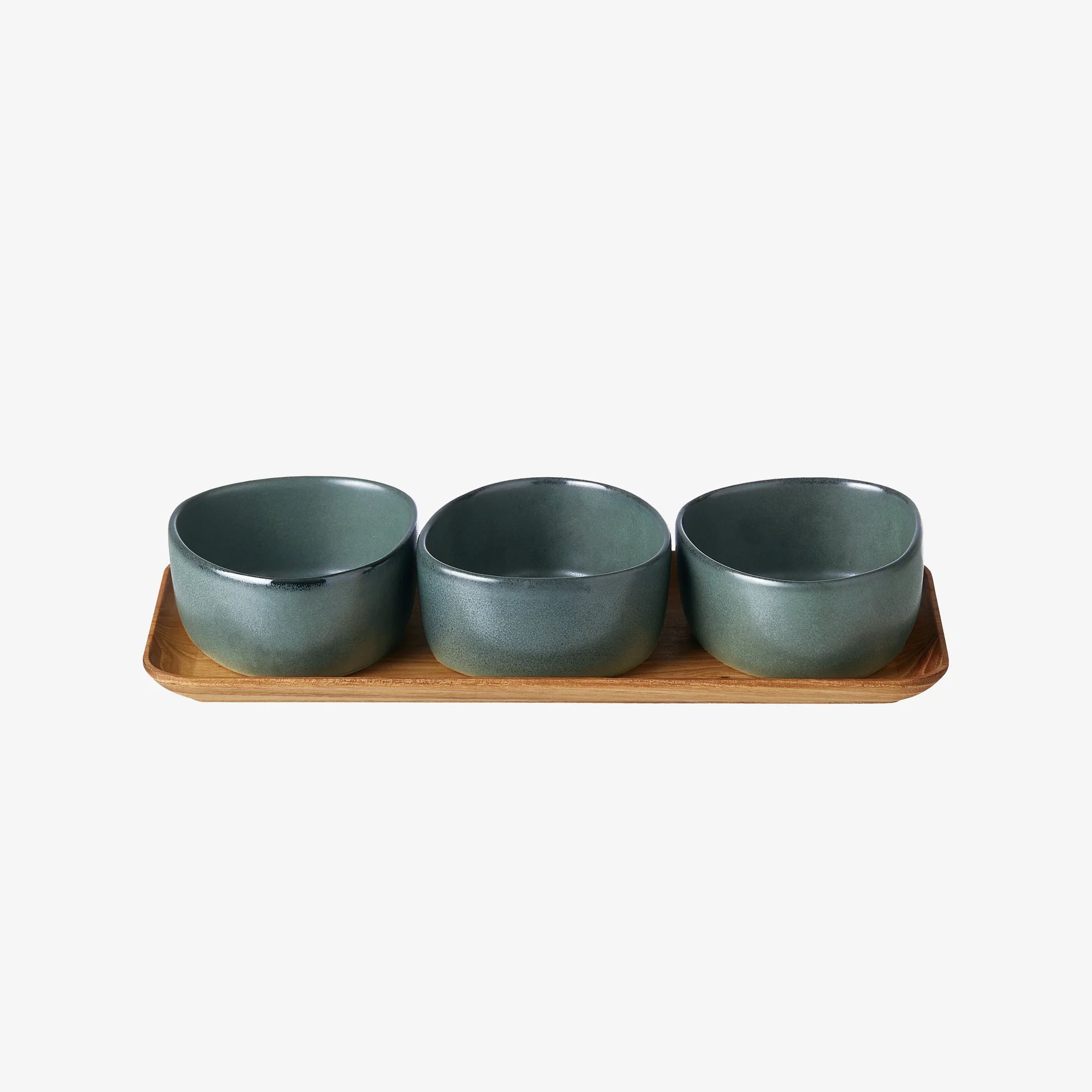 three northern green organic bowls on teak wooden tray by aida cut-out
