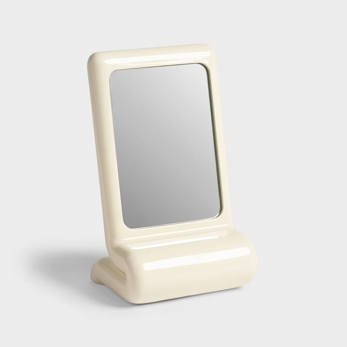 off-white chunky resin vanity mirror with curved frame by &k
