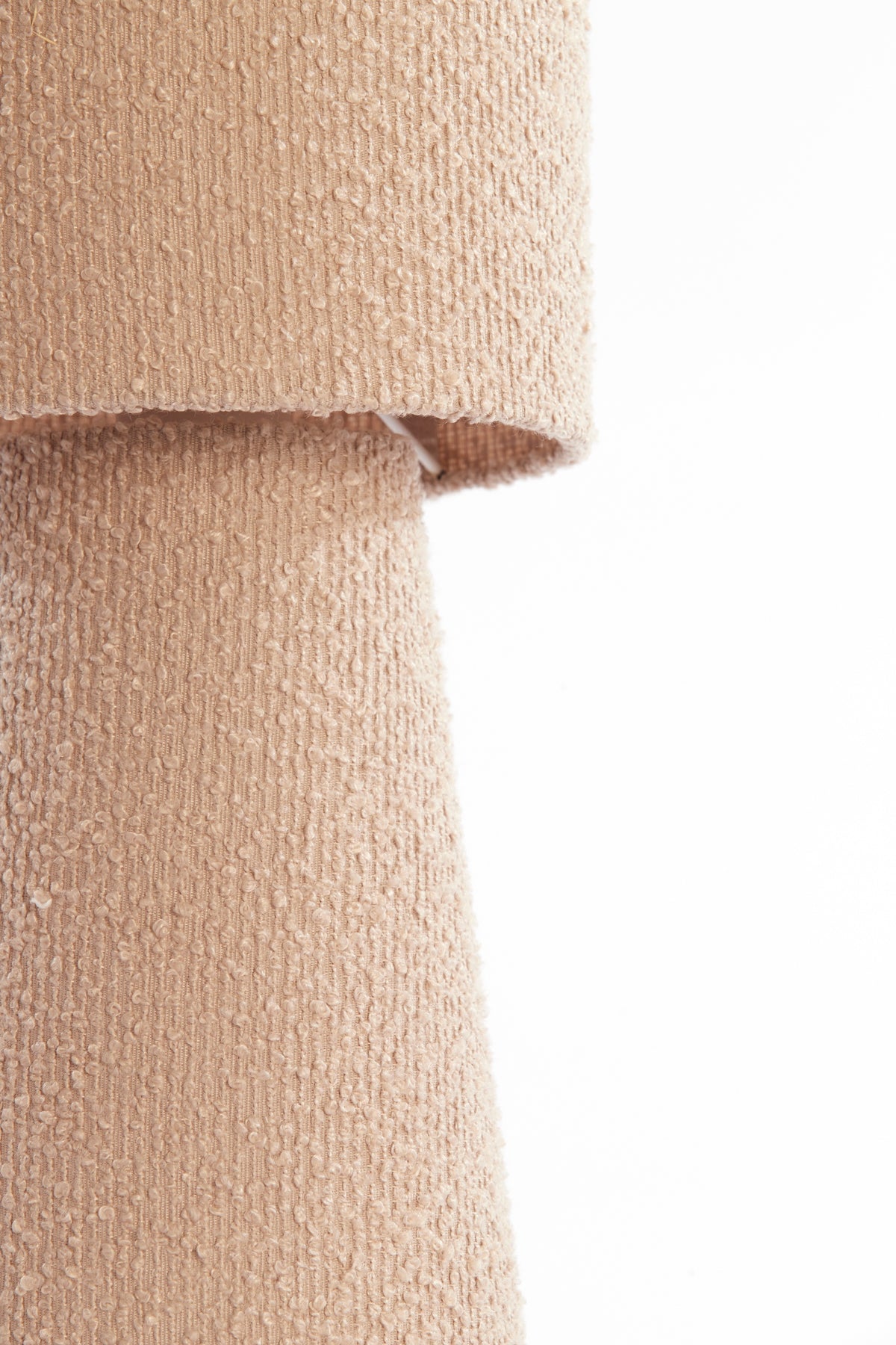 close-up of sand bouclé lamp shade texture
