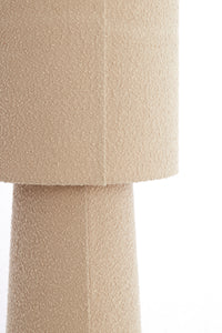 close-up of sand boucle fabric on floor lamp shade and base
