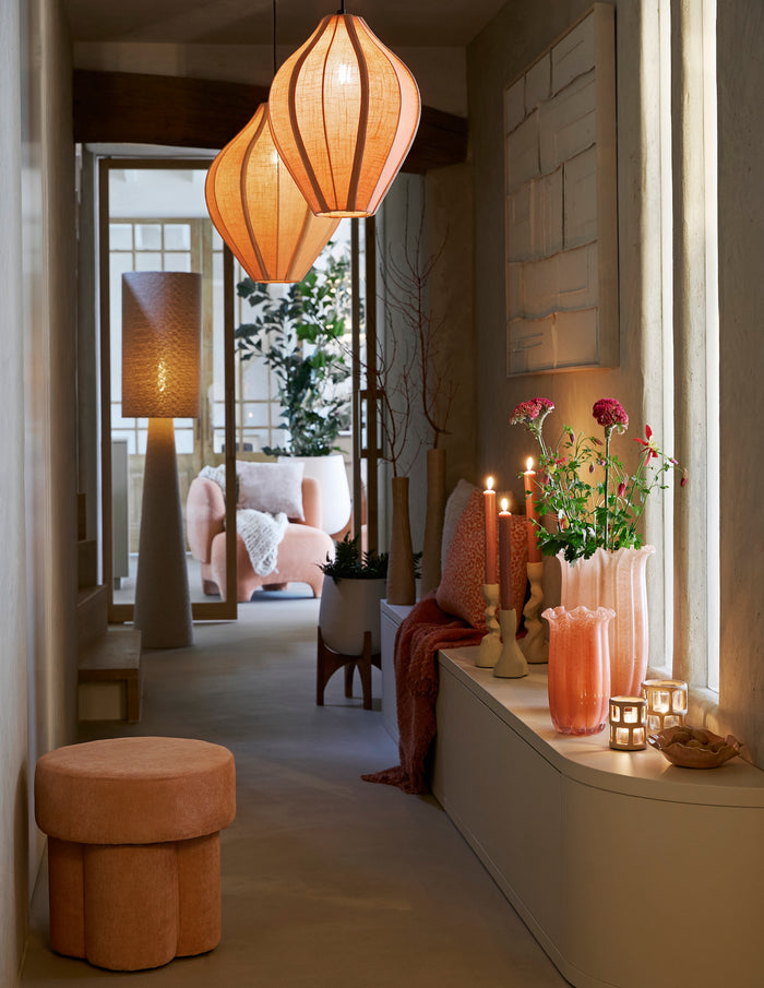 sand boucle floor lamp styled in a modern hallway with warm-toned decor
