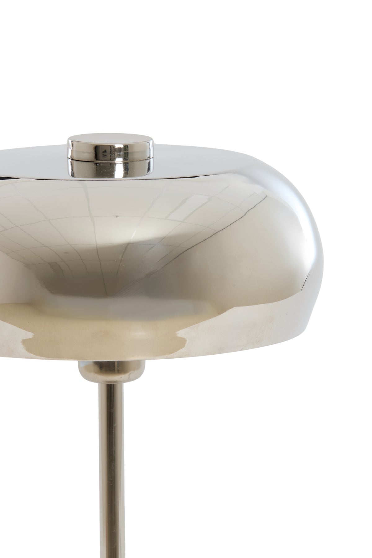 reflective shiny nickel dome shade on Surin table lamp
