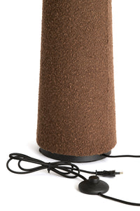 Full product image of the DEVIA tall brown bouclé floor lamp.
