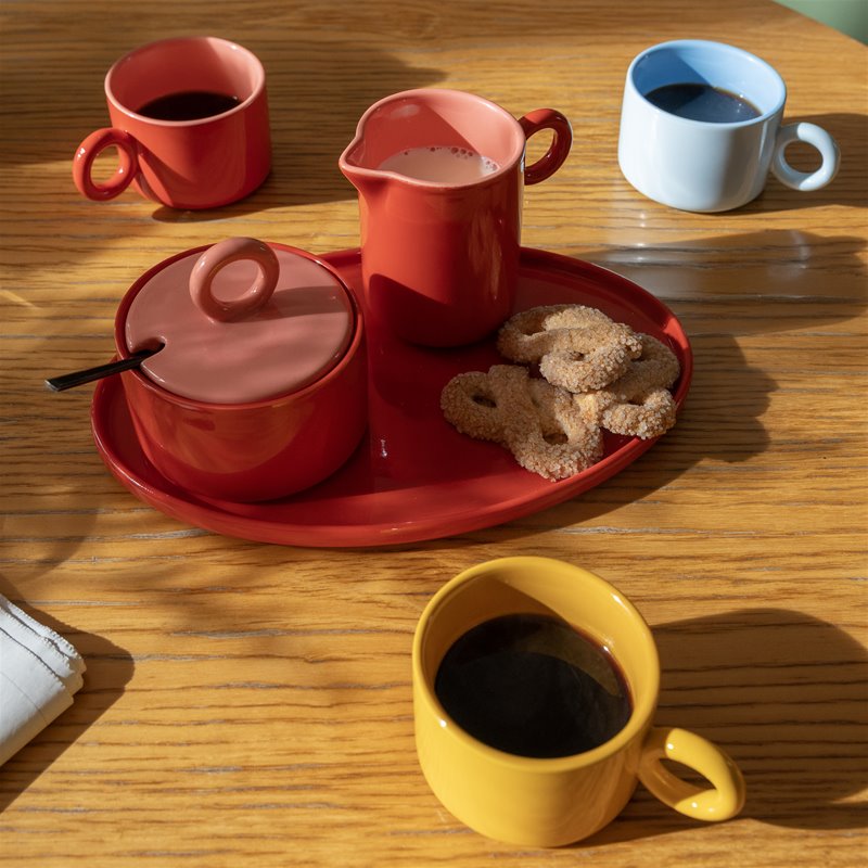 &k chiquito red milk jug styled with sugar pot and mugs for cosy coffee moment