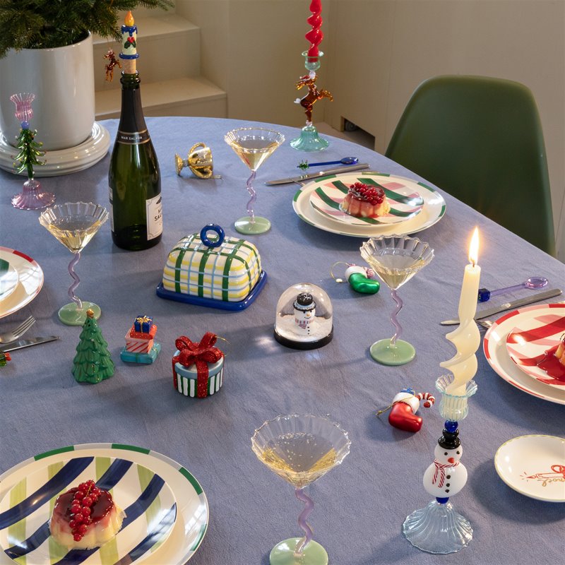 colourful plaid ceramic butter dish styled on a festive dining table
