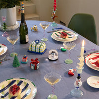 colourful plaid ceramic butter dish styled on a festive dining table
