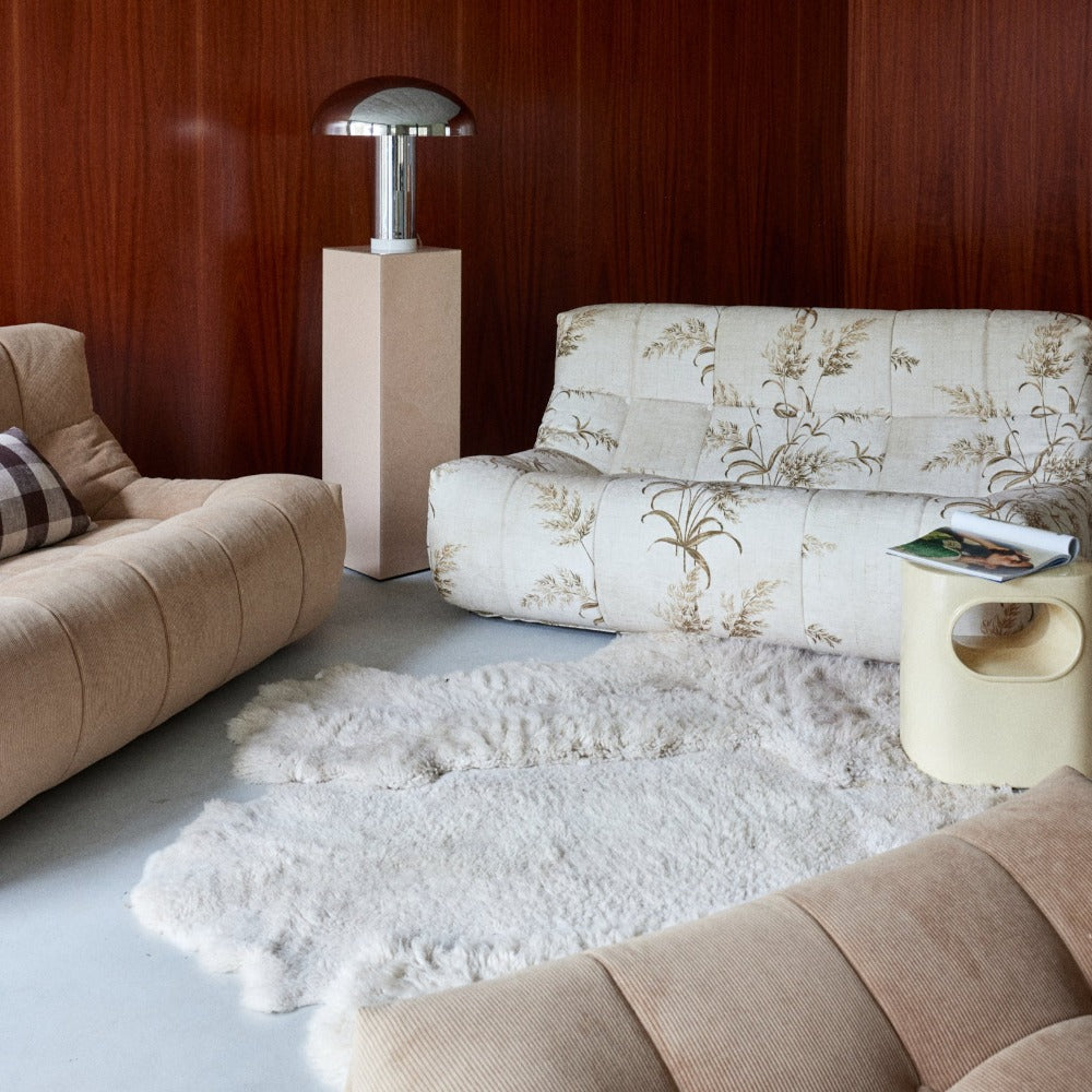 living room space with cream coloured space sofa table from hkliving taking prode of place amongst the sofas