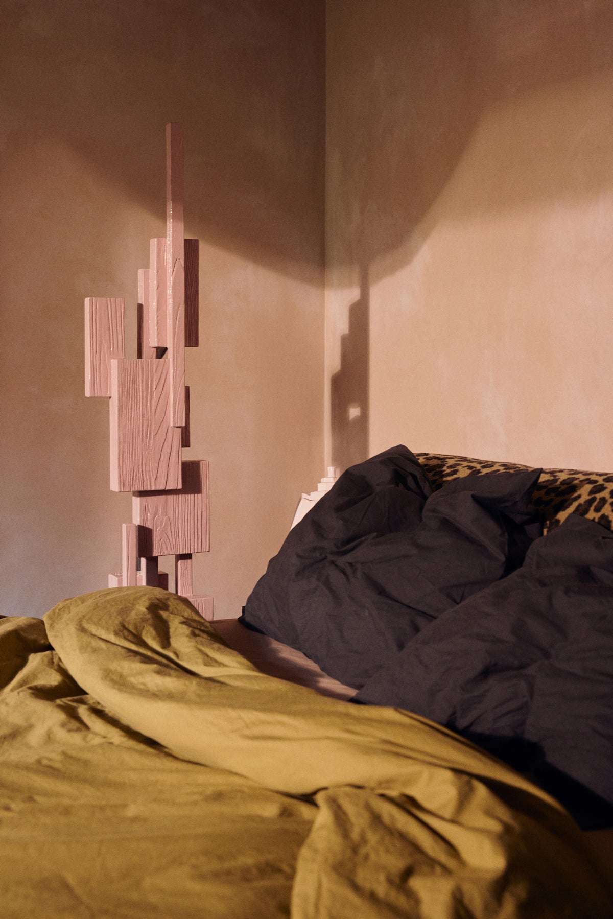 Soft pink Skyscraper sculpture by HKLIVING in a warm-toned bedroom beside the bed