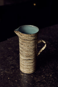 70s Ceramics Jug in Brew styled with matching mugs, egg cups and pasta bowls from the HKLIVING 70s Ceramics collection