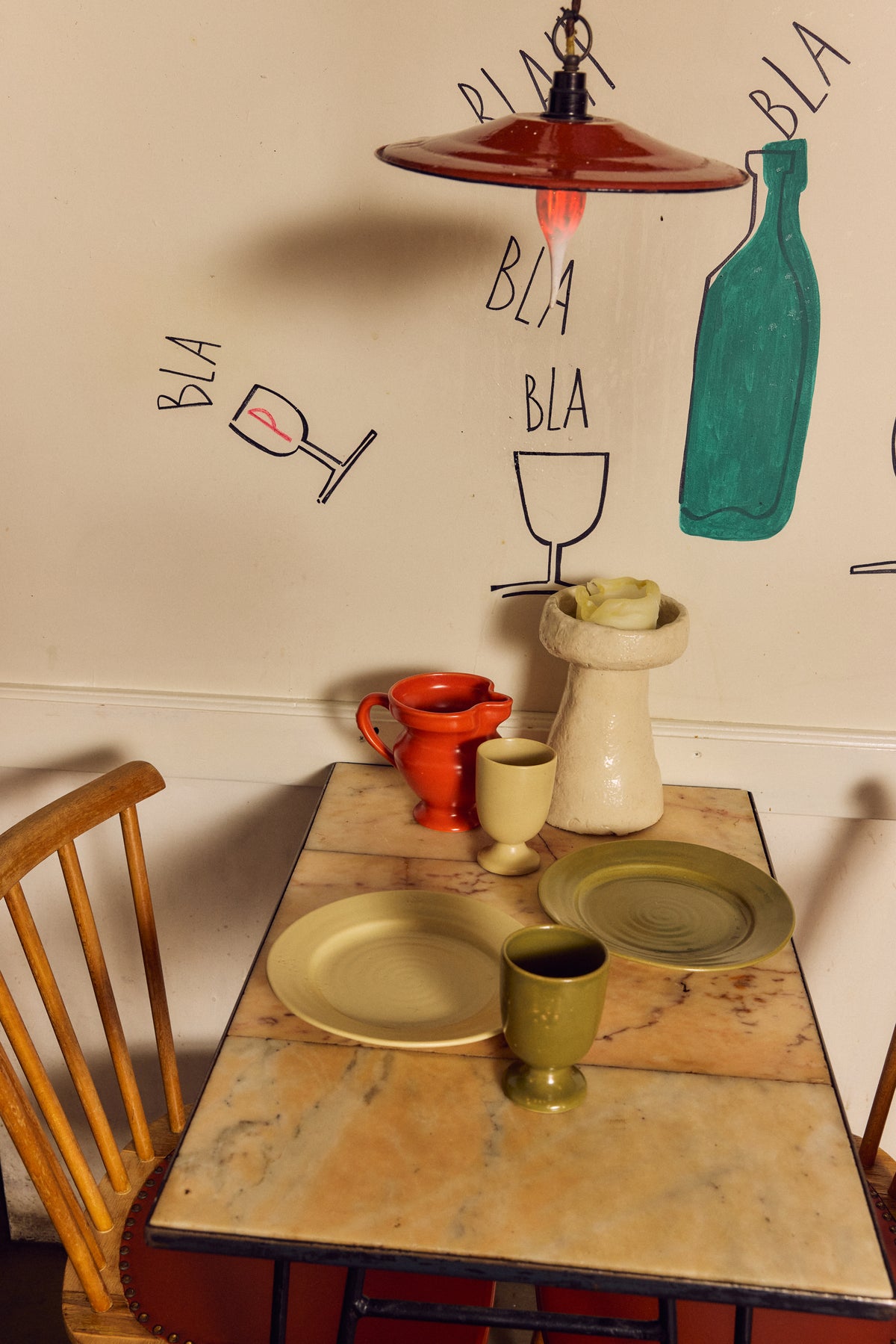 HKLIVING Farmhouse Ceramics small jug in red styled on a marble-topped table with a matching goblet, candle holder and stoneware plates