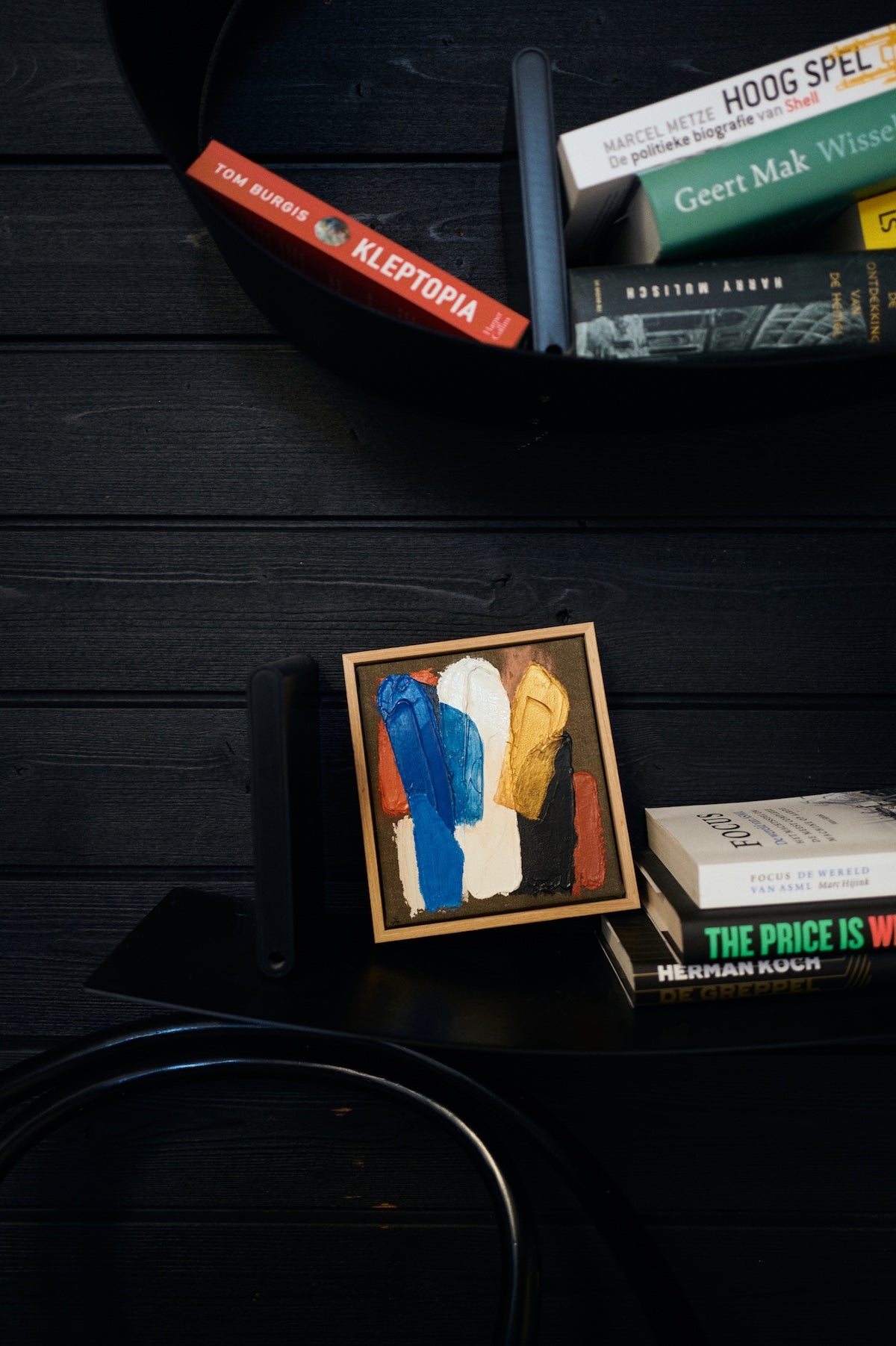 HKLIVING Moonlight Strokes abstract artwork styled on a black shelf with books