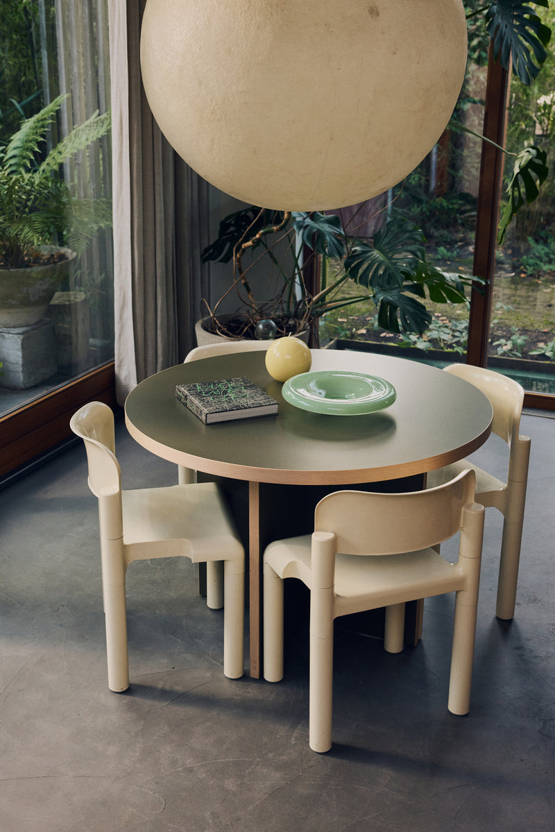 round 110cm HKLIVING dining table in a compact dining space bringing colour and warmth to everyday meals