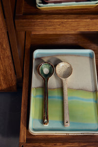 HKLIVING Hills ceramic serving spoons on colourful 70s ceramics tray showing layered glaze