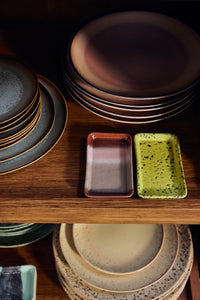 HKLIVING 70s Ceramics yellow corn trinket dish next to plum dish on wooden shelf, with stacked plates behind