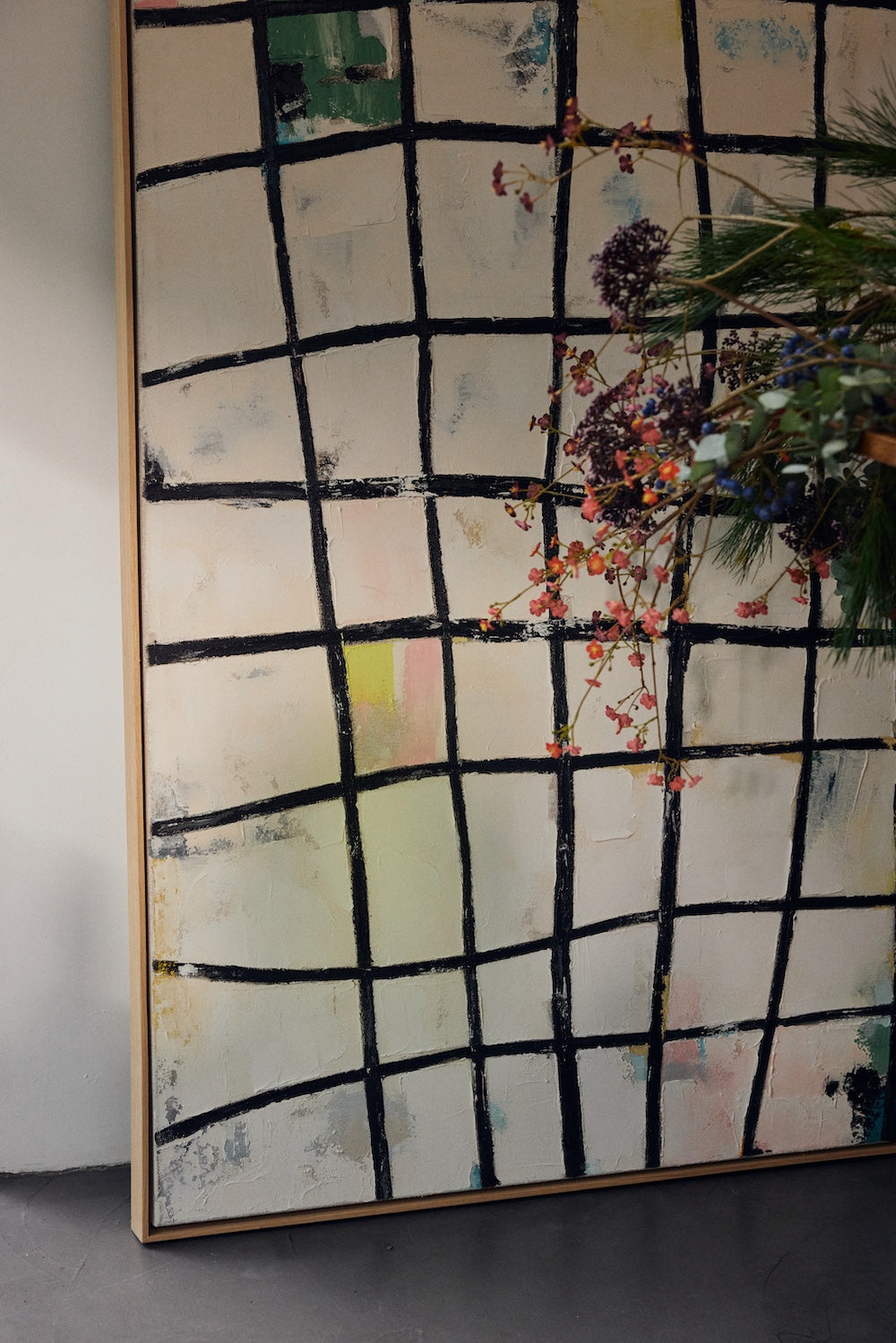Close-up styling detail of Wired framed canvas wall art by HKLIVING with foliage and dried flowers