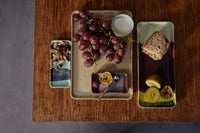 cherry stoneware cake tray by HKLIVING styled with fruit bread and colourful 70s ceramics