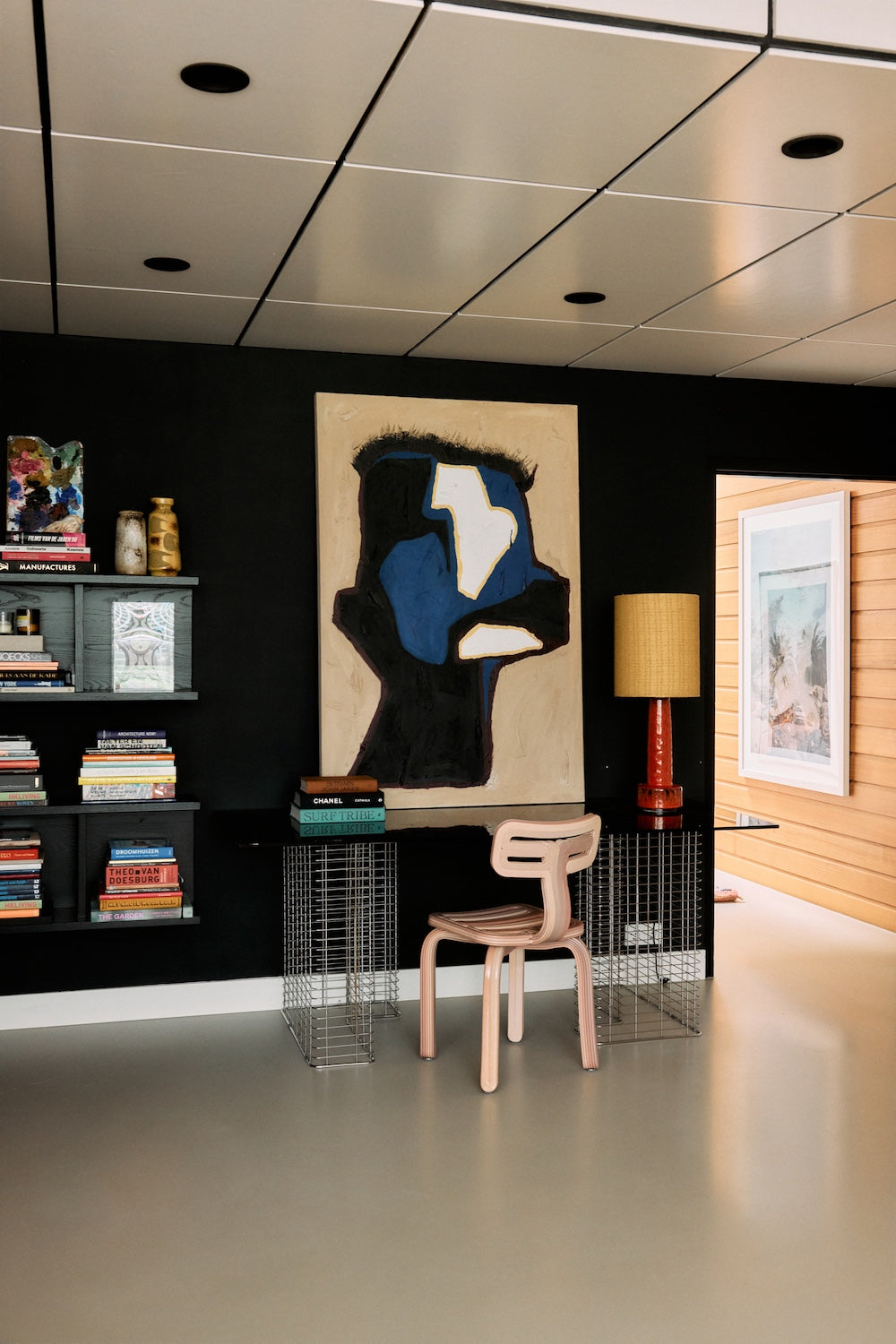 Mind Map wall art by Gabriella Ferrero for HKLIVING hung on a black wall in a book-lined study
