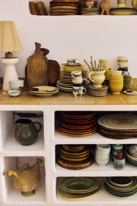 HKLIVING Farmhouse Ceramics small jug in cream styled on an open shelf unit with wooden boards, plates and mugs from the wider collection