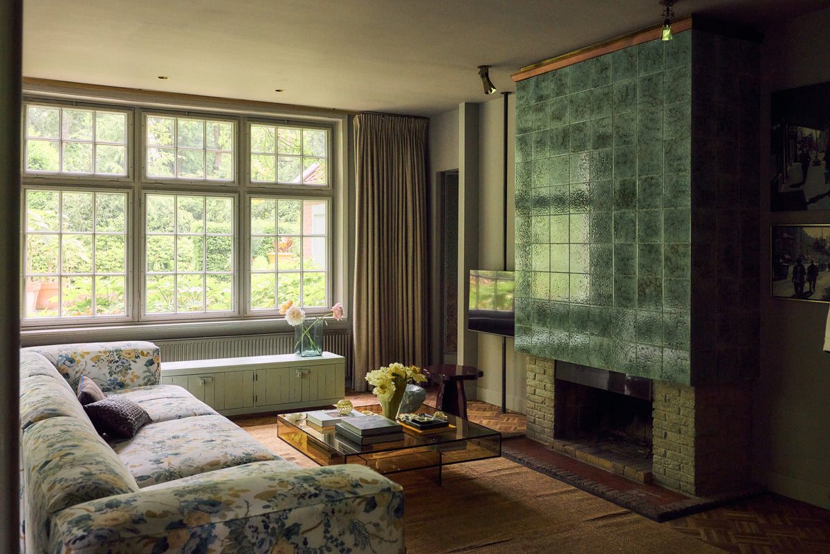 HKLIVING Acrylic Coffee Table in olive styled in a living room in front of a fireplace with a green tiled surround
