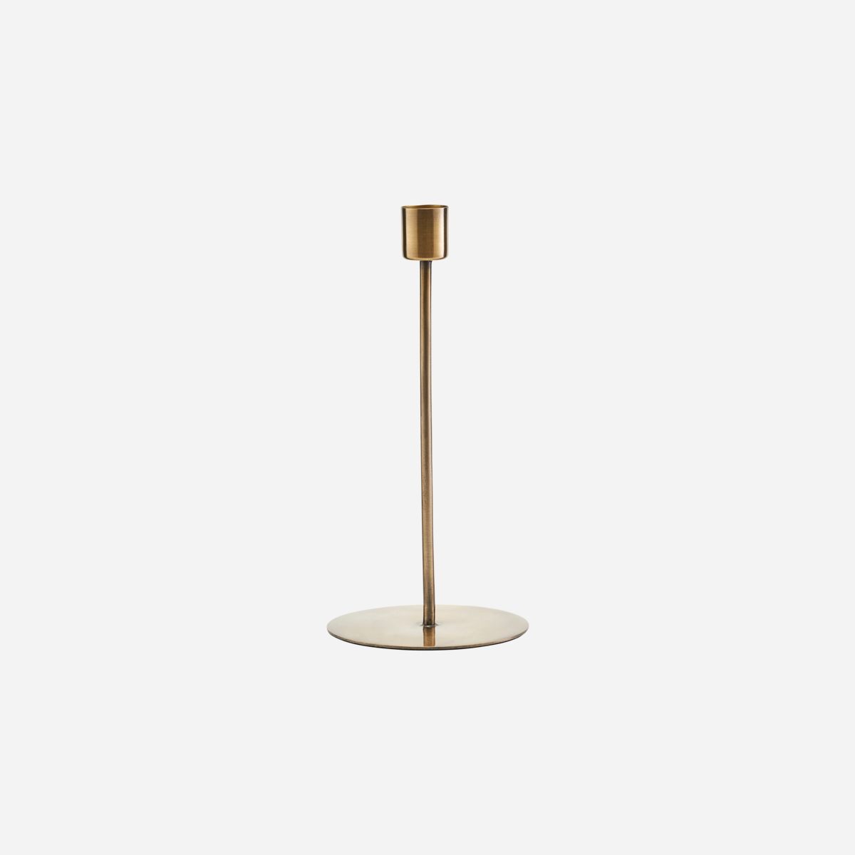 lightly shiney, tall and thin candle holder with a generous base from house doctor