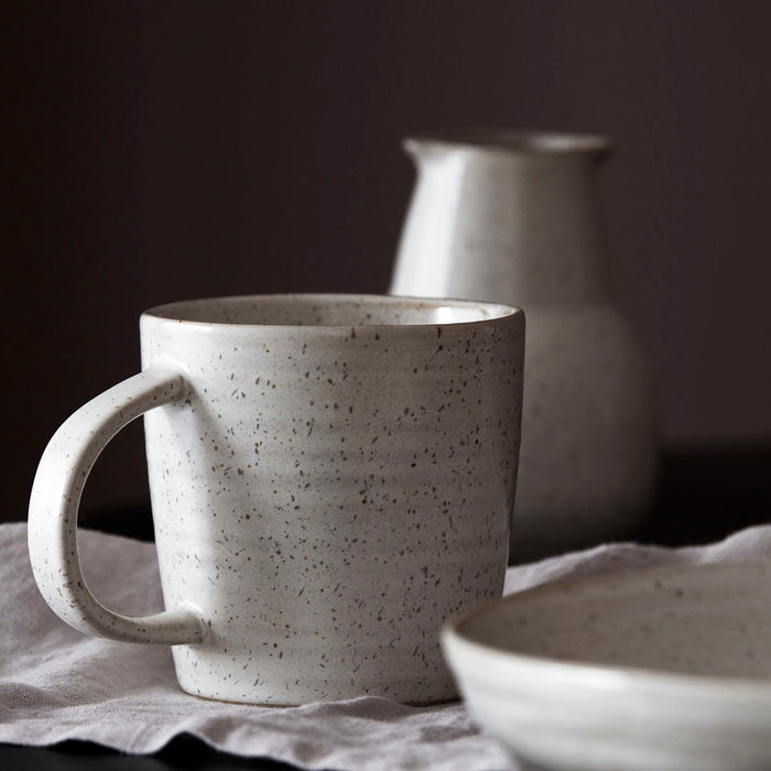 Large stoneware mug with speckled glaze variation