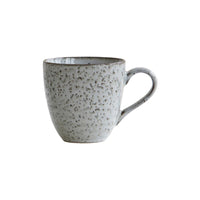 Grey and blue ceramic mug with rustic speckled texture