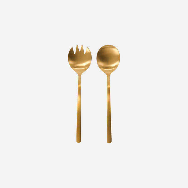 shimmering golden salad servers with a spoon and spork to give a touch of elegance to your meals from house doctor