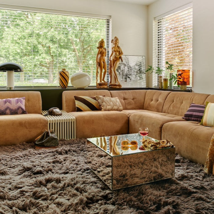 Scandinavian-inspired sand bench as a calming accent in a tranquil home