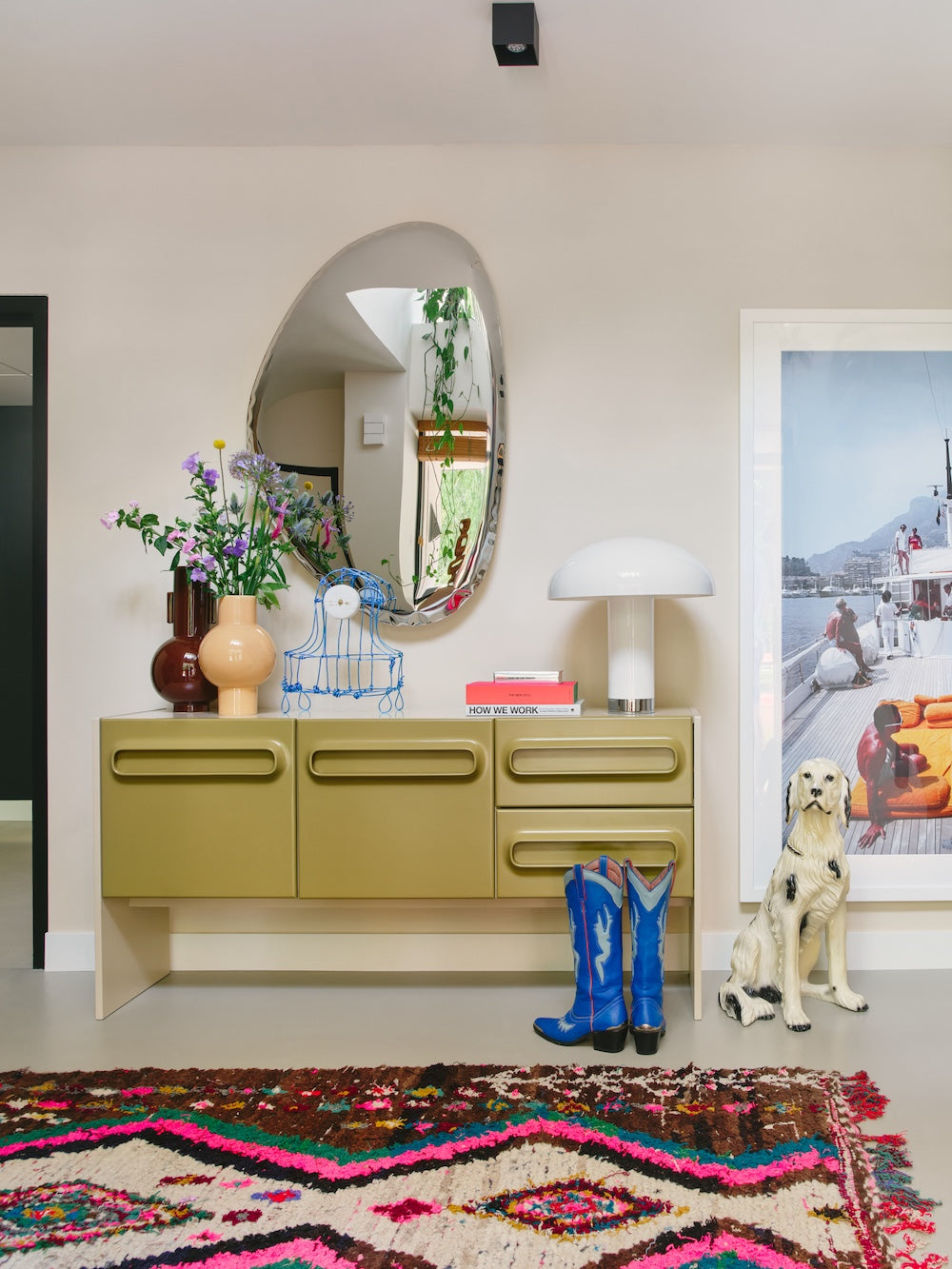 HKLIVING cream lounge table lamp styled on an olive green sideboard beneath an oval mirror, with vases and a framed print