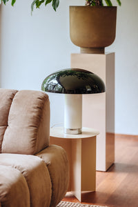 HKLIVING monochrome lounge table lamp on a side table beside a beige corduroy sofa, with a large planter on a pedestal