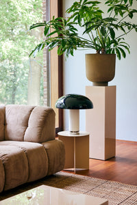 HKLIVING monochrome lounge table lamp beside a beige corduroy sofa and potted plant, in front of a garden window