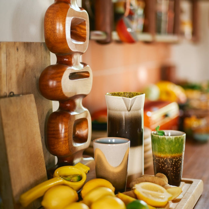 hkliivng 70s crockery in display in a kitchen in different colours and mugs