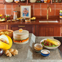 a ktichen scape with the sink int he background and a biscuit barrel on the side among other crockery items from hklivings nordic range