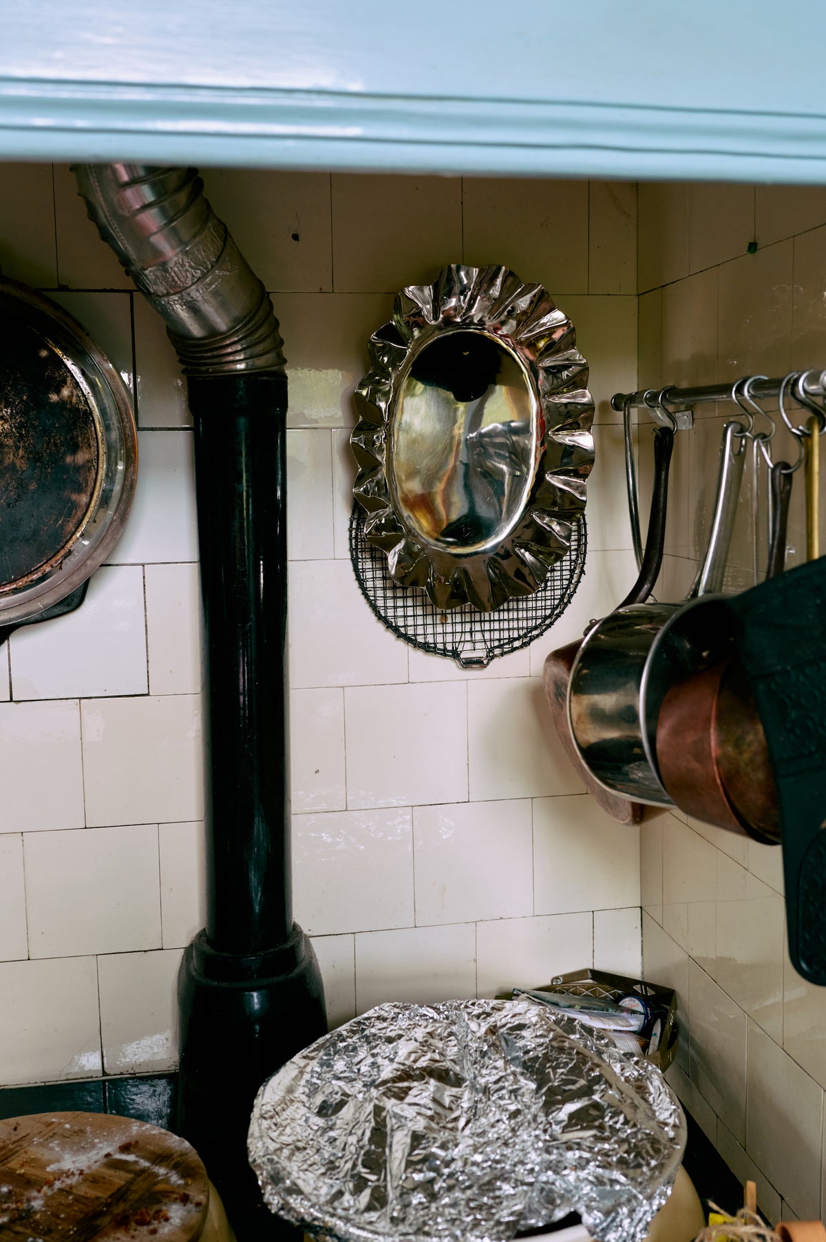 Medium HKLIVING chrome tray hung on a tiled kitchen wall beside copper pans and a range cooker