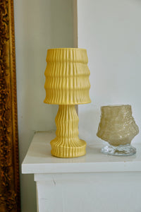 HKLIVING ochre ribbed ceramic table lamp styled on a shelf beside a ribbed amber glass vase and gilt-framed mirror