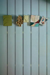 The Pocket Exhibit: Palette wall art panel displayed alongside four other pieces from HKLIVING's Pocket Exhibit series on a painted wall