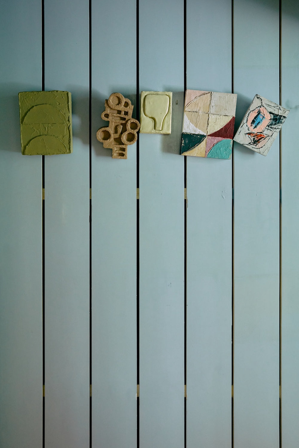 The Pocket Exhibit: Palette wall art panel displayed alongside four other pieces from HKLIVING's Pocket Exhibit series on a painted wall