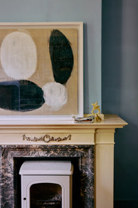 Parallel framed artwork by HKLIVING displayed on a mantelpiece beside a marble fireplace