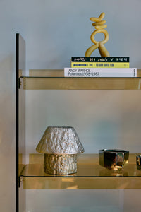 artefact aluminium table lamp styled on modern chest of drawers by hkliving
