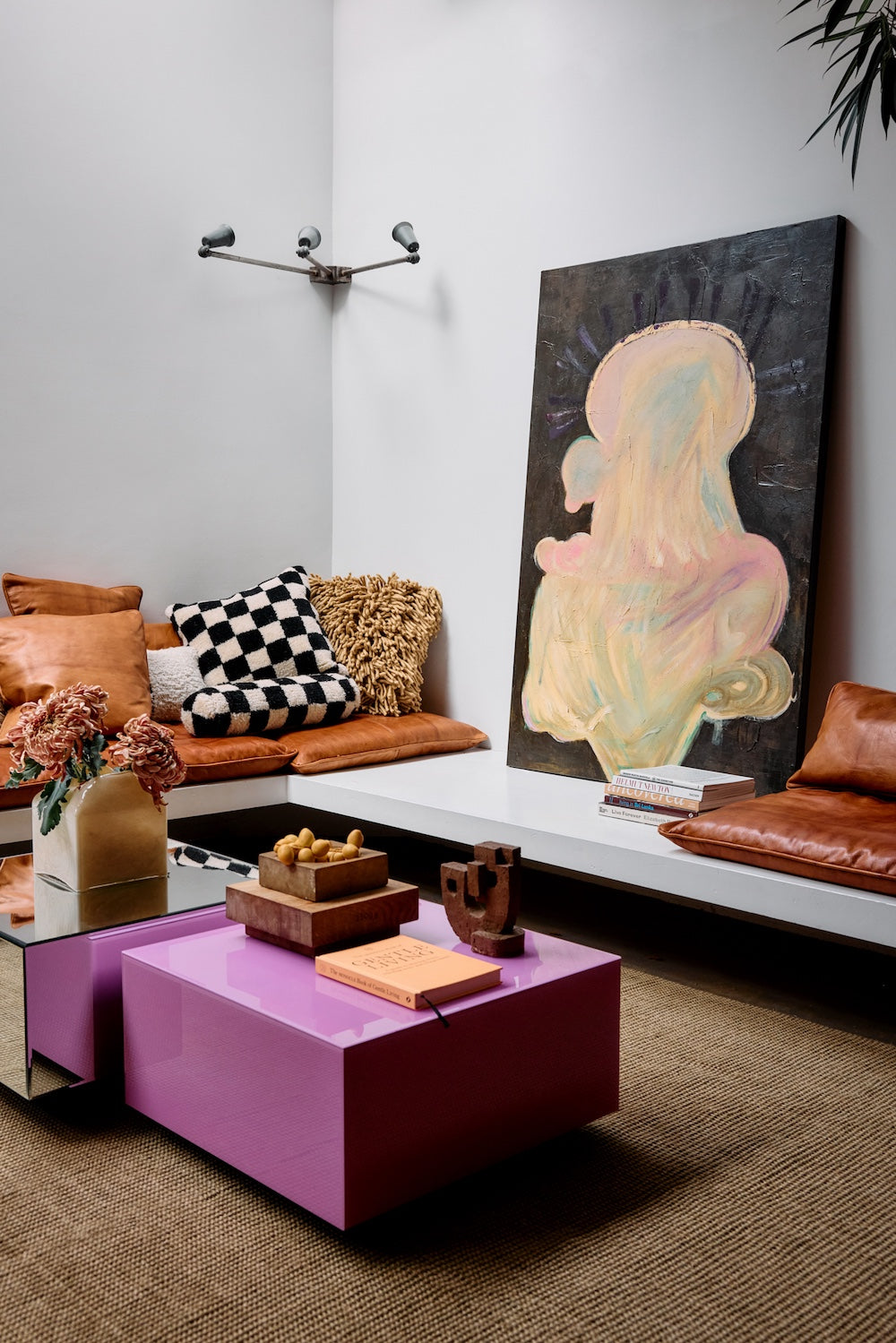 Pappagallo wall art by Gabriella Ferrero for HKLIVING leaning against a wall in a colourful living room corner