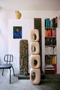 Volt plexi portrait by HKLIVING displayed on a plinth beside sculptural ceramic pieces and a bookshelf