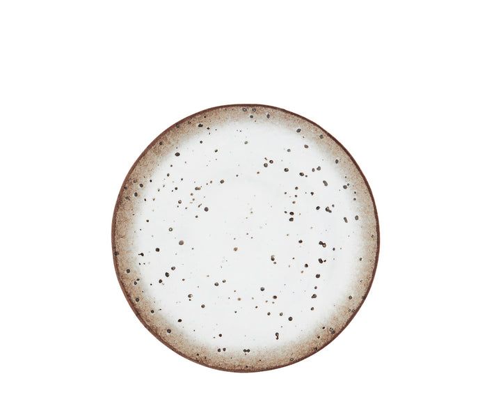 stoneware lunch plate with off white glaze and brown speckles viewed from above
