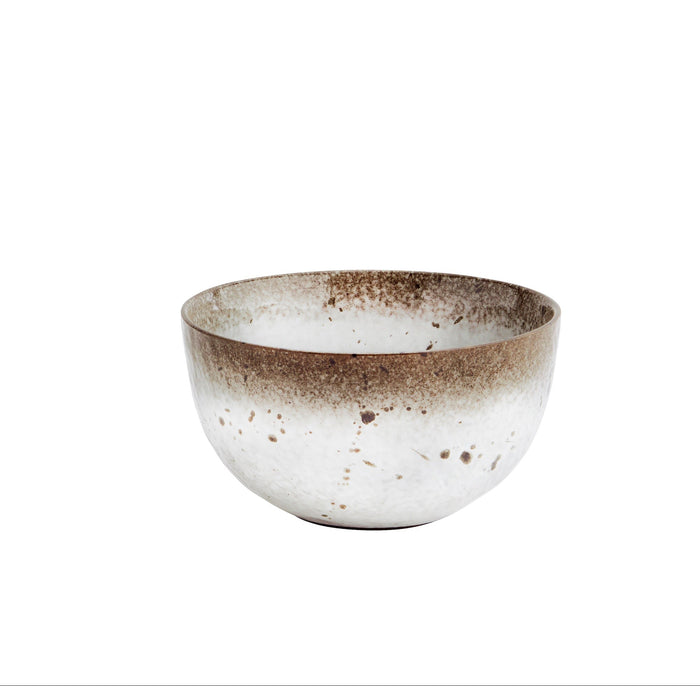 reactive glaze stoneware bowl in white and brown shown from front view
